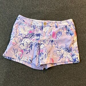 Lilly Pulitzer Callahan stretch shorts with a purple and pink floral pattern